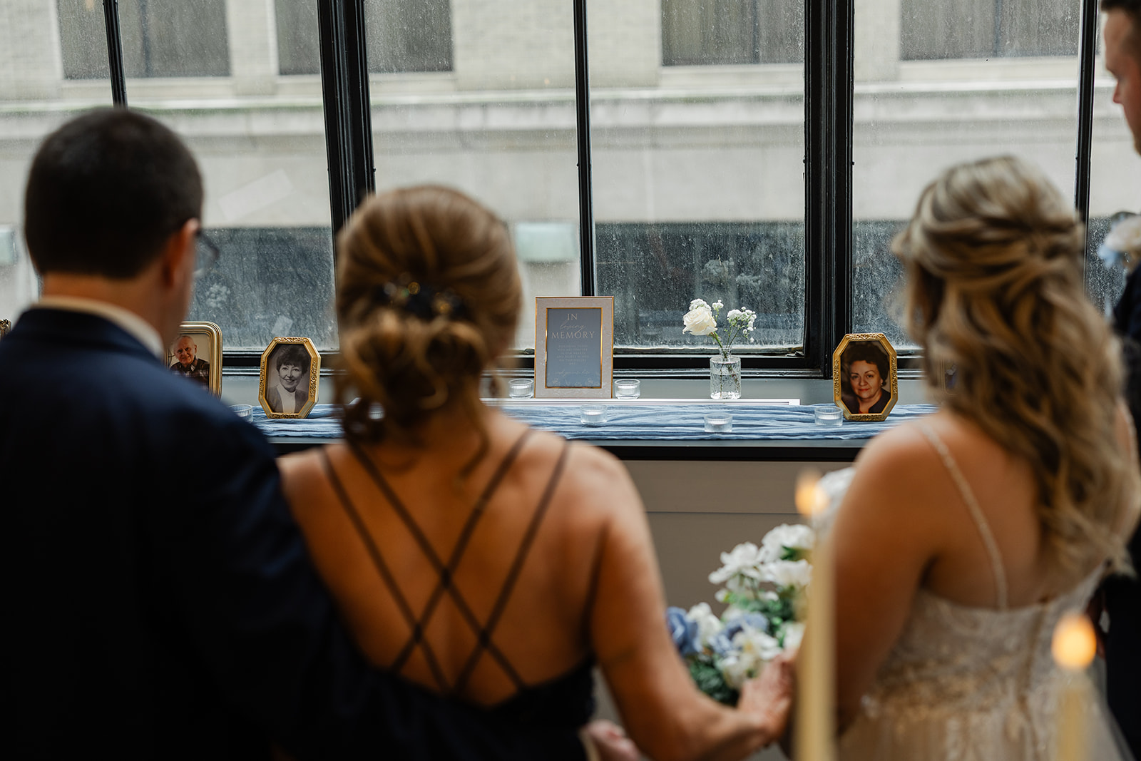 Rochester wedding photographer capturing a documentary prayer circle in memory of late family members.